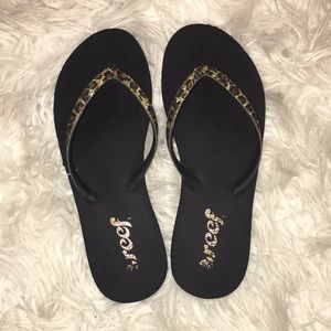 reef cheetah print flip flops